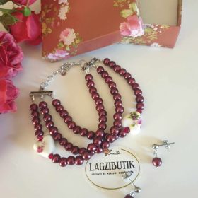   Háromsoros, bordó teklagyöngy karkötő-fülbevaló szett.