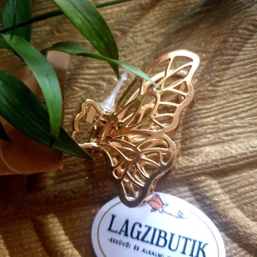 Pillangó hajcsipesz, arany színű fémből.