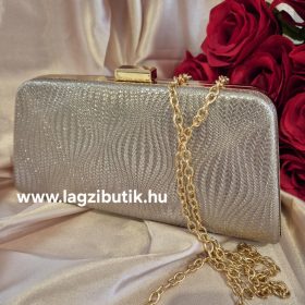 Arany táska, nyomott mintával.