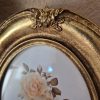 Barokk, ovális fotókeret, arany színben.
