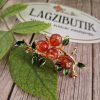 Bogyós ág bross, narancs színben.