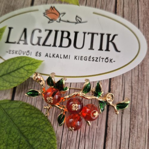 Bogyós ág bross, narancs színben.