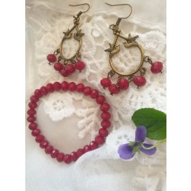 Bordó, madaras lógós fülbevaló-karkötő szett.
