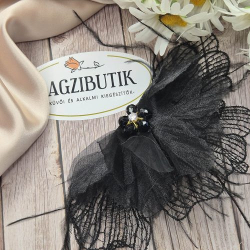 Csipkés, strucctollas virág kitűző többféle színben.