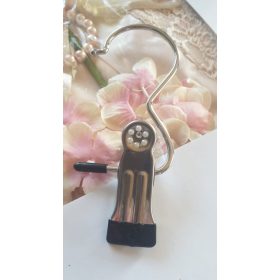 Fátyolcsipesz, fátyoltartó.