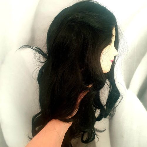 Fekete, hosszú póthaj, paróka, hullámos.