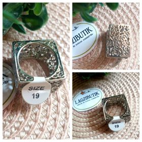 Fém, áttört mintás kocka alakú gyűrű.