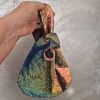 Flitteres szütyő, kistáska.