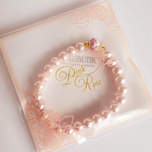 Púderrózsaszín teklagyöngy karkötő, porcelán, virágos köztessel.