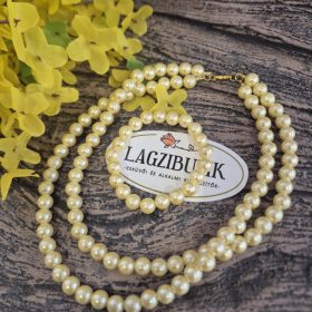 Sárga gyöngy, duplasoros nyaklánc-karkötő szett.