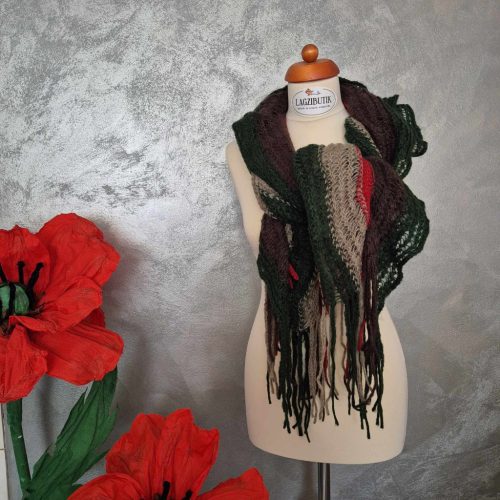 Zöldes színű kötött, gumis sál.